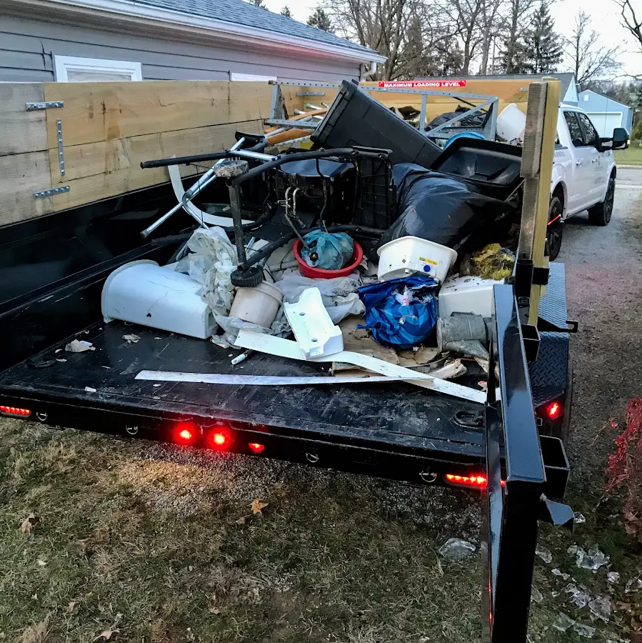 Roll-off dumpster delivered to a residential driveway in Groveland